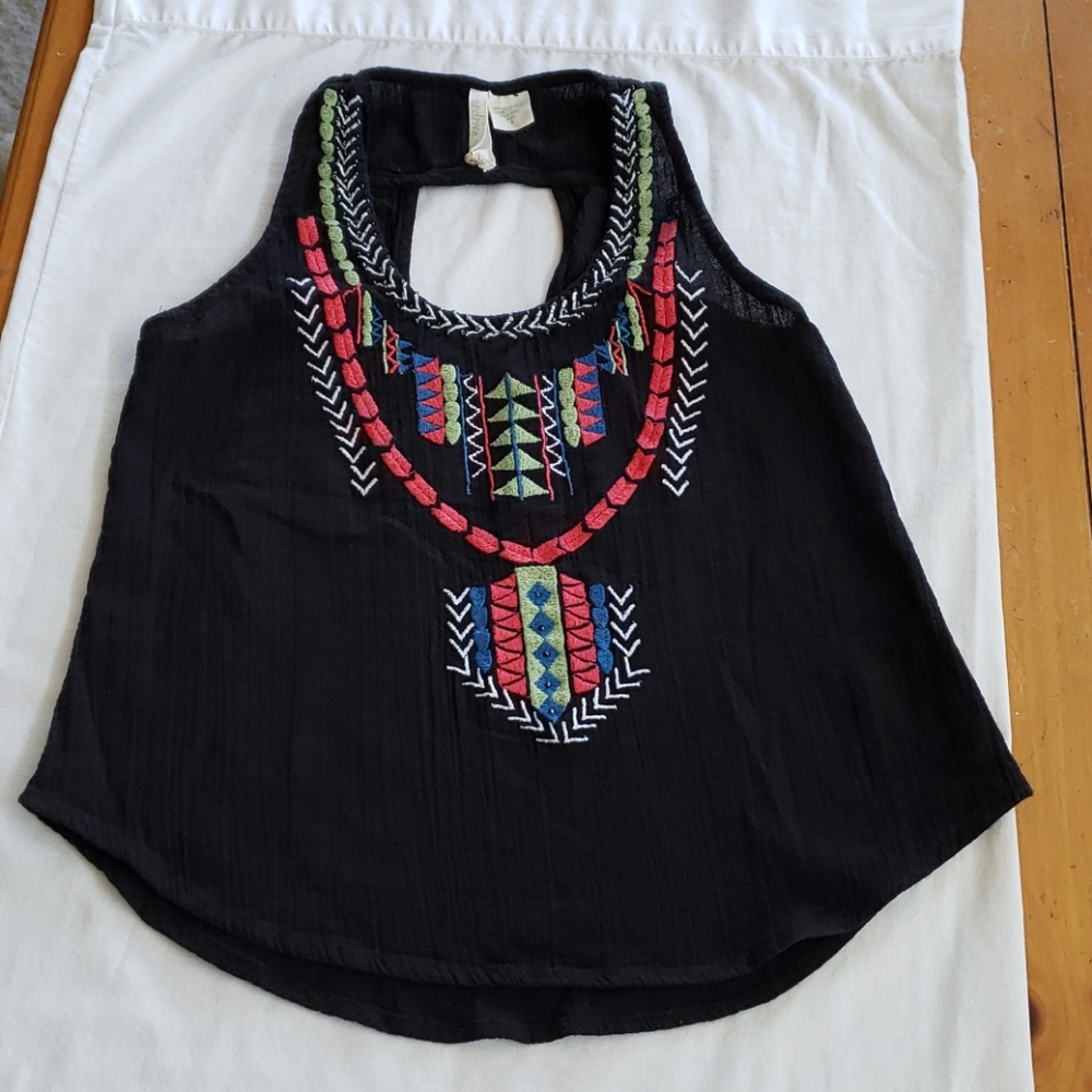 Gauze top with embroidery and beading.